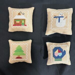 Hand made holiday cross-stitch accent pillow set